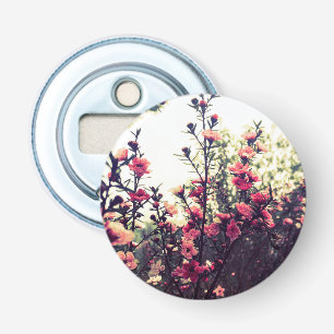 Mooi roze wilde bloemenweide foto button flesopener