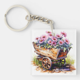 Mooie Aster bloemen in een wiel vat Sleutelhanger
