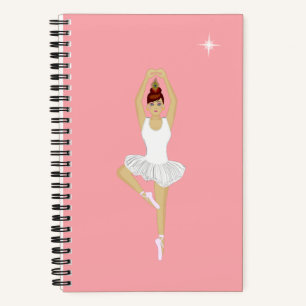 Mooie balletdanseres op roze notitieboekje notitieboek