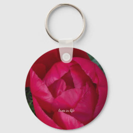 Mooie bloeiende rode pioen sleutelhanger