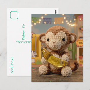 Mooie gehaakte aap met banaan in de dierentuin briefkaart