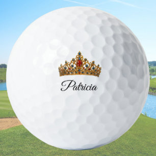 Mooie gouden kroon en aangepaste naam golfballen