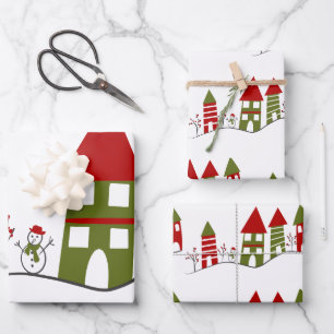 Mooie groene en rode dorp in de sneeuw met Kerstmi Inpakpapier Vel