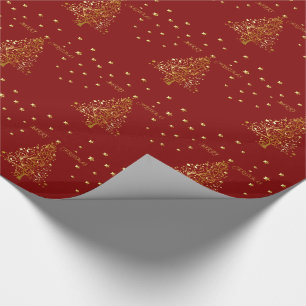 Mooie metallic gouden kerstboom op donkerrood cadeaupapier