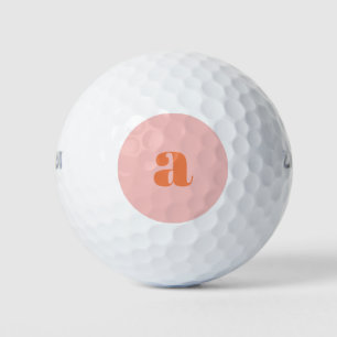 Mooie pastel roze oranje monogram retro lettertype golfballen