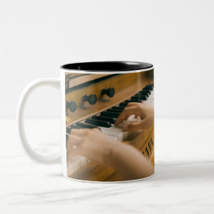Mooie piano tweekleurige koffiemok
