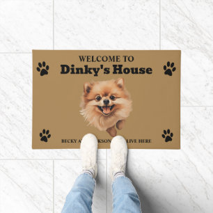 Mooie Pomeranian-hondenfoto Deurmat