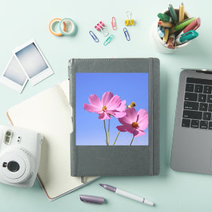mooie roze bloemen die een heldere blauwe hemel om sticker