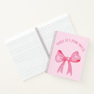 Mooie roze spiraalnotitieboek met een strik notitieboek