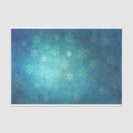 Mooie sneeuwvlokken op de schaduw van blauw-groen tissuepapier