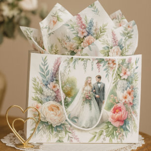Mooie trouwbloemen met bruid bruidegom cadeautas