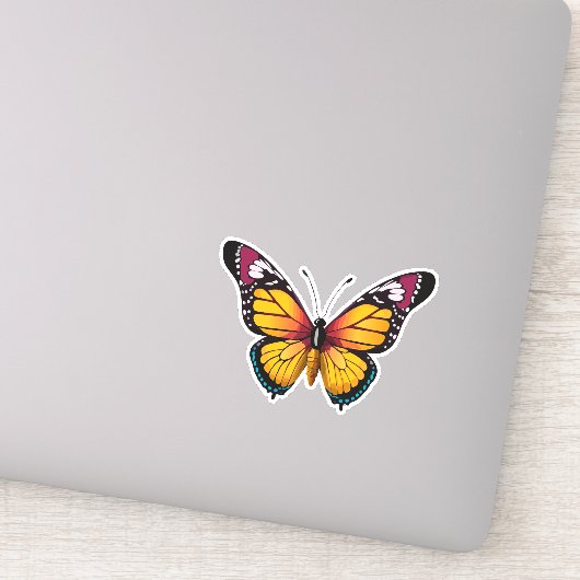 Mooie veelkleurige vlinder sticker (Detail)