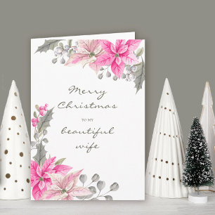 Mooie vrouw mooie roze poinsettia kerst kaart