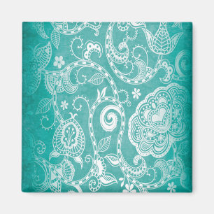 Mooie witte en blauwe bloemen, bladeren en zeugen magneet