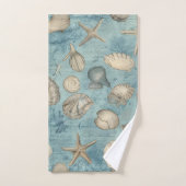 Mooie  zeeschelpen in blauw bad handdoek (Handdoek)