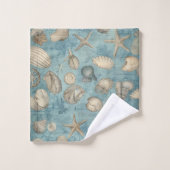 Mooie  zeeschelpen in blauw bad handdoek (Wasdoekje)