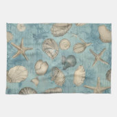 Mooie  zeeschelpen in blauw theedoek (Horizontaal)