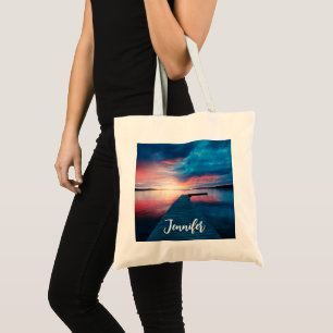 Mooie zonsondergang op een rustig meer tote bag
