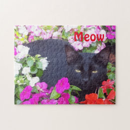 Mooie zwarte kat met groene ogen in bloemen legpuzzel