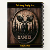 Moose carving in beboste bergen notitieboek (Achterkant)