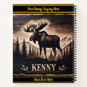 Moose houtsnijwerk in donker hout met achtergrond notitieboek (Achterkant)