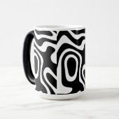 Morphing Mok, 15 oz 2023 Magische Mok (Voorkant links)