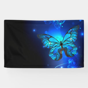 Morpho Butterfly in de donkere achtergrond Spandoek