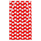 Motif blanc de coeur sur le petit sac rouge de (Dos)