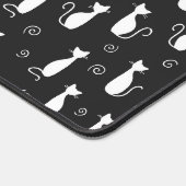 Motif blanc en silhouette de chat sur noir (Coin)