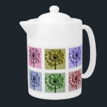 Motif d'art floral aux fleurs colorées<br><div class="desc">Style pop art Gerbera motif en fleurs aux couleurs pastel sur théière.</div>