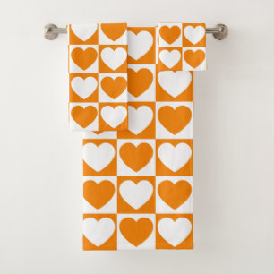 Motif de À damiers orange et blanc aux coeurs