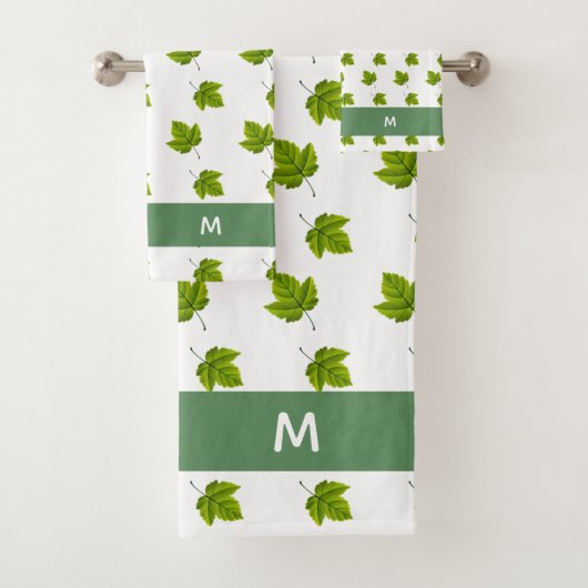 Motif de feuille verte et monogramme sur fond blan (En situation)
