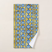 motif de l'oeil malin sur la texture dorée (Serviette à main)