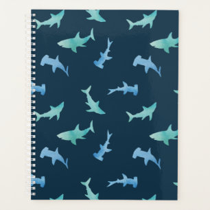 Motif de silhouettes de requins nageant à l'aquare
