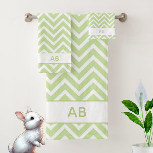 Motif élégant à chevrons et monogramme sur vert sa