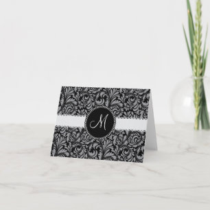 Motif floral de damassé grise noire initiale de
