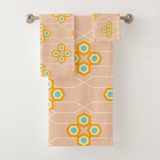 Motif floral hexagonal sur fond pêche (En situation)