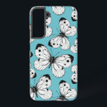 Motif papillon de choux<br><div class="desc">Design motif fait de papillons de chou sur arrière - plan bleu.</div>