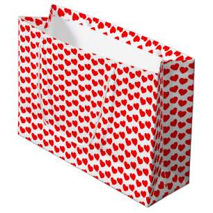 Motif rouge de coeur sur le grand sac blanc de