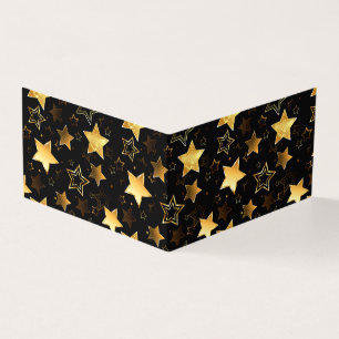 Motif sans couture avec des étoiles dorées