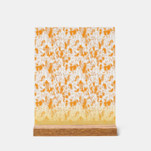 Motif textile avec orange et gol vibrants