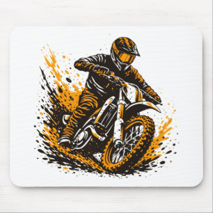 Motorcrossrijder glijdt met kracht door de modder muismat