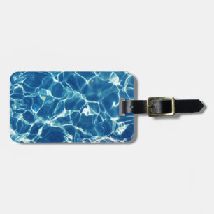 Mousserend blauw water bagagelabel