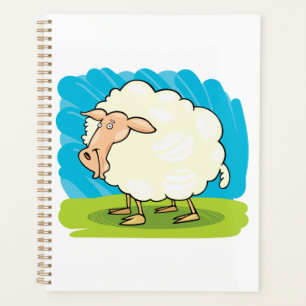 Moutons blancs et duveteux sur l'herbe
