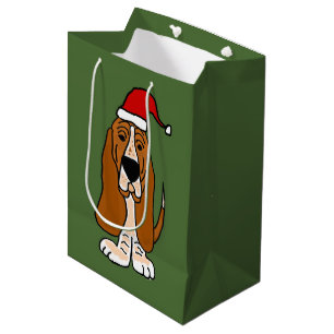 Moyen Basset Hound drôle dans le sac de cadeau de Noël