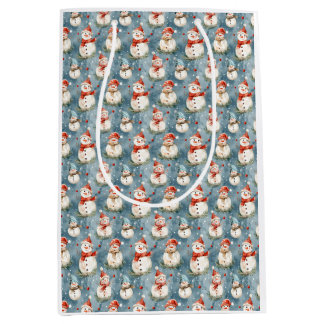 Moyen Snowmen aquarelle sur le sac cadeau bleu
