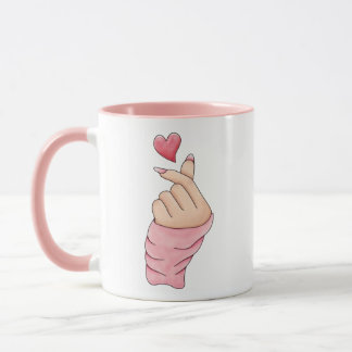 Mug à deux tons avec un cœur de doigt Kawaii migno
