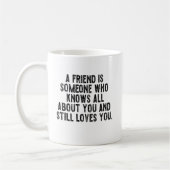 Mug A friend is someone who knows all about you and st (Gauche)