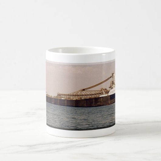 Mug Adam E. Cornélius (Centre)