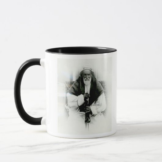 Mug Al Khalifah d'AIS Ibn Ali (Gauche)